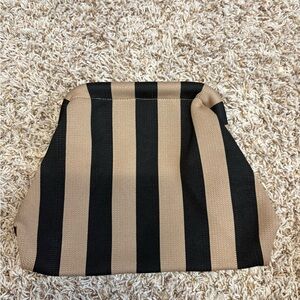 Black and tan clutch